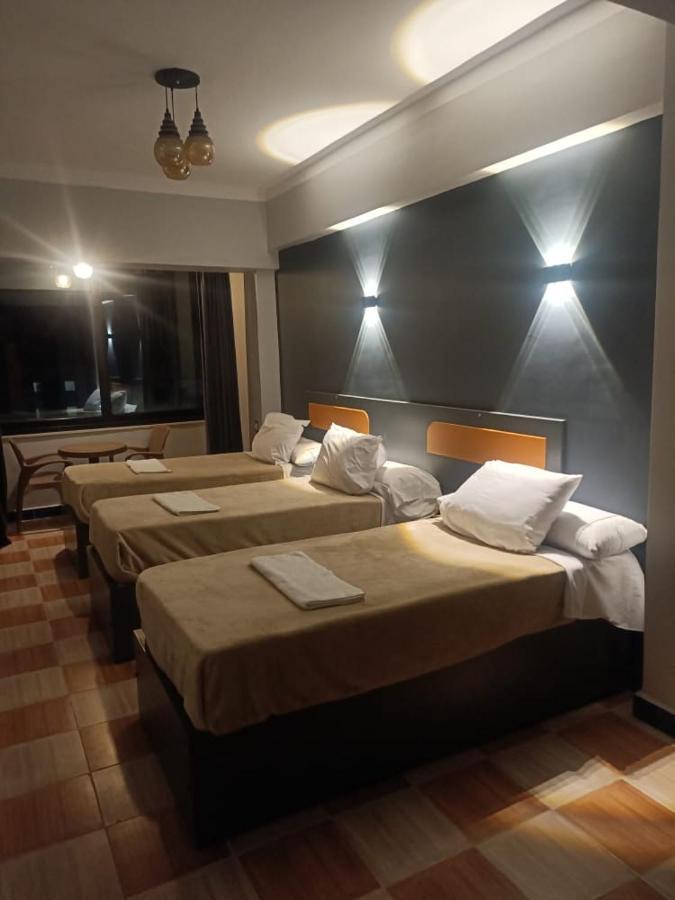 Royal Hotel Qinā Extérieur photo